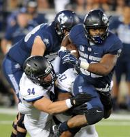 Aggies run all over Wildcats in opener